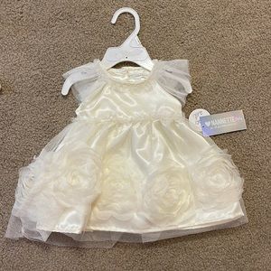 Brand new. Nannette baby. White floral dress with ruffled bloomer diaper cover.